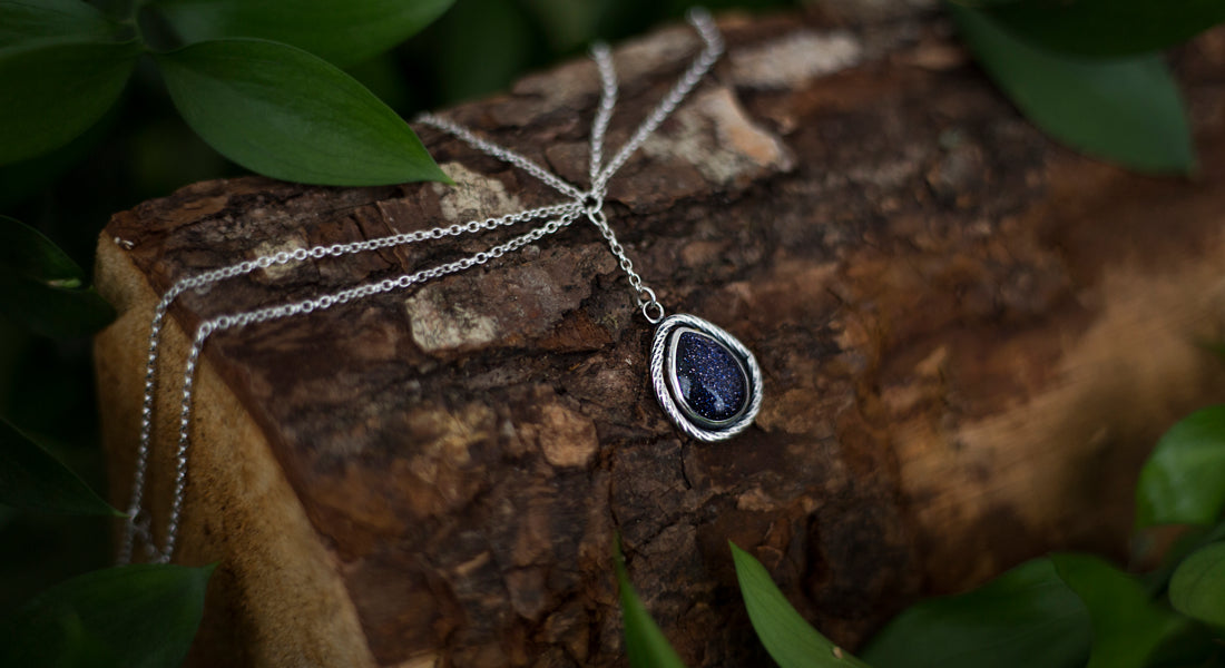 Sterling silver hair chain with blue goldstone drop