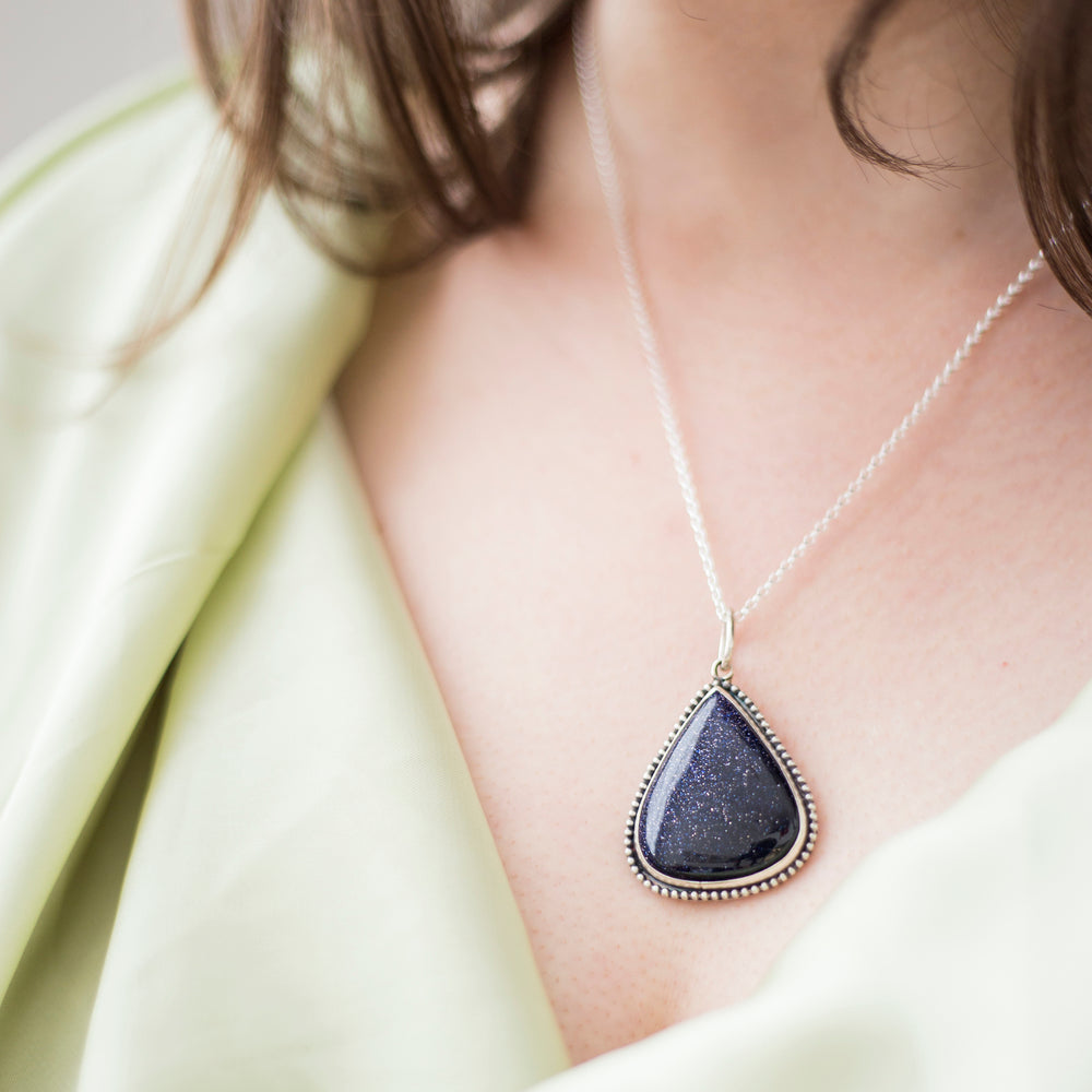 Blue goldstone pendant