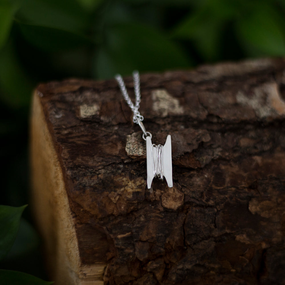 Shuttle of fate necklace